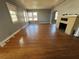 Bright living room with hardwood floors, a fireplace, and lots of windows providing ample sunlight and a cozy atmosphere at 536 89Th N Ave, St Petersburg, FL 33702