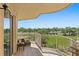 Beautiful balcony with comfortable seating and stunning views of the lush green landscape at 555 5Th Ne Ave # 424, St Petersburg, FL 33701