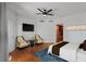 Inviting bedroom showcasing hardwood floors, neutral decor, and comfortable seating, perfect for relaxation and rest at 555 5Th Ne Ave # 424, St Petersburg, FL 33701