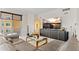 This cozy living area has a stylish entertainment center and a view at 555 5Th Ne Ave # 424, St Petersburg, FL 33701