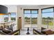 Living space with an open concept to the dining area with a view to the outdoors at 555 5Th Ne Ave # 424, St Petersburg, FL 33701