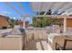 Impressive outdoor kitchen boasts stainless steel appliances, a built-in grill and ample counter space perfect for entertaining at 555 5Th Ne Ave # 424, St Petersburg, FL 33701