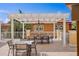 Gorgeous community patio area with outdoor seating, ceiling fans, and manicured landscaping for luxurious outdoor living at 555 5Th Ne Ave # 424, St Petersburg, FL 33701