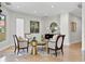 Inviting sitting room has neutral furniture, tile flooring and recessed lights for a calming atmosphere at 555 5Th Ne Ave # 424, St Petersburg, FL 33701