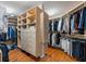 Spacious walk-in closet with custom shelving and storage solutions, perfect for organization and maximizing wardrobe space at 555 5Th Ne Ave # 424, St Petersburg, FL 33701
