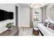 Cozy bedroom showcasing neutral decor, modern lighting, and a comfortable bed with stylish accents at 5703 Silverside Pine Ct, Lakewood Ranch, FL 34211