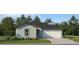 Charming single-story home with a well-manicured lawn, a two-car garage, and attractive landscaping at 5709 Yellow Hornbill Ave, Wimauma, FL 33598