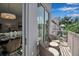 Charming balcony with seating, showcasing a glimpse of the interior and a pleasant outdoor view at 600 3Rd S Ave # 201, St Petersburg, FL 33701