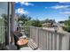 Cozy balcony with seating, offering a scenic view of the neighborhood and blue skies, perfect for relaxation at 600 3Rd S Ave # 201, St Petersburg, FL 33701