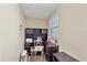 Cozy office space with dark furniture, ample shelving, and a bright window for natural light at 600 Gardens Edge Dr # 614, Venice, FL 34285