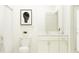 Clean, bright bathroom featuring white cabinets, granite counters, and tile shower at 6838 E 115Th St, Palmetto, FL 34221