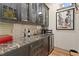 A built-in bar area features a wine refrigerator and counter space for serving at 7508 N Ola Ave, Tampa, FL 33604