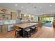 Spacious kitchen with an island, breakfast bar, and open layout flowing into the living area at 7508 N Ola Ave, Tampa, FL 33604