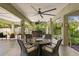 Outdoor bar area with stylish seating, perfect for enjoying poolside views and entertaining at 7508 N Ola Ave, Tampa, FL 33604