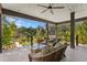 Relaxing outdoor patio featuring comfortable seating and lush garden views at 7508 N Ola Ave, Tampa, FL 33604