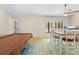 Spacious recreation room with a pool table and dining area, offering both entertainment and dining options at 7660 Holiday Dr, Spring Hill, FL 34606