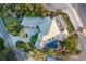 Luxury beachfront home boasts a pool, a deck, and lush landscaping on the ocean at 770 N Manasota Key Rd, Englewood, FL 34223