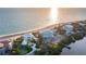 Sprawling beach homes are surrounded by lush landscaping and the tranquil ocean at 770 N Manasota Key Rd, Englewood, FL 34223