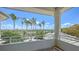 Enjoy the view from this private balcony with views of the Gulf waters and surrounding tropical landscape at 770 N Manasota Key Rd, Englewood, FL 34223