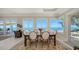 Elegant dining room with ocean views at 770 N Manasota Key Rd, Englewood, FL 34223