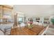 Dining room with open floor plan, access to living area, and waterfront views at 770 N Manasota Key Rd, Englewood, FL 34223