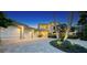 Beautiful home featuring a well-manicured lawn, mature trees, and a grand entrance with a driveway at 770 N Manasota Key Rd, Englewood, FL 34223