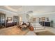 Spacious foyer features a staircase, display cabinets, and seating area at 770 N Manasota Key Rd, Englewood, FL 34223