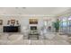 Inviting living room boasts a fireplace and ocean views, creating a serene and elegant atmosphere at 770 N Manasota Key Rd, Englewood, FL 34223