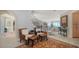 Bright living room showcasing elegant seating, staircase, and beautiful wood flooring, all with stunning ocean views at 770 N Manasota Key Rd, Englewood, FL 34223