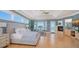 This room offers beautiful ocean views, a fireplace, a built-in cabinet, and a seating area at 770 N Manasota Key Rd, Englewood, FL 34223
