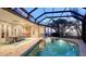 Stunning pool and spa are enclosed with beautiful views from all angles at 770 N Manasota Key Rd, Englewood, FL 34223