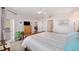 Comfortable bedroom with a large window, and a wood-framed bed, and a ceiling fan at 960 Starkey Rd # 1503, Largo, FL 33771