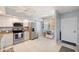 Modern kitchen featuring stainless steel appliances, white cabinetry, and updated fixtures at 960 Starkey Rd # 1503, Largo, FL 33771