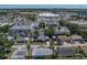 Aerial view of home surrounded by commercial areas at 10562 Lake Dr, Seminole, FL 33772
