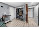 The bedroom features a closet, a desk, and modern flooring at 10562 Lake Dr, Seminole, FL 33772