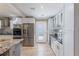 Bright kitchen with stainless steel appliances and modern cabinetry at 11210 Wheeling Dr, Tampa, FL 33625