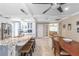 Open kitchen featuring an island with barstool seating and modern appliances and dining area at 11210 Wheeling Dr, Tampa, FL 33625
