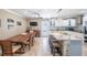 Kitchen and dining area with stainless steel appliances and modern cabinets at 11210 Wheeling Dr, Tampa, FL 33625