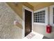 Close up front door of condo #103 at 1231 Godavari Way # 103, Wesley Chapel, FL 33543