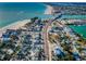 Beautiful aerial view featuring homes, a bridge, and waterfront views at 12409 Gulf Blvd, Treasure Island, FL 33706