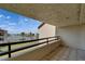 Private balcony with waterfront views and tile flooring at 126 1St E St # 102, Tierra Verde, FL 33715