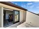 Cozy balcony just off the bedroom offers a tranquil spot to unwind, with glimpses of the inviting interior at 126 1St E St # 102, Tierra Verde, FL 33715