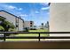 Enjoy beautiful water views from this private balcony with lush landscaping and serene surroundings at 126 1St E St # 102, Tierra Verde, FL 33715