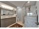 Beautiful bathroom with double vanity, marble walk-in shower, and elegant fixtures at 126 1St E St # 102, Tierra Verde, FL 33715