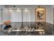 Close-up of kitchen island cooktop featuring granite countertops and natural light from a sliding glass door at 126 1St E St # 102, Tierra Verde, FL 33715