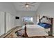 Bright main bedroom boasts access to balcony and an abundance of storage with built-in closet at 126 1St E St # 102, Tierra Verde, FL 33715