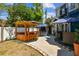 Outdoor entertaining area with a gazebo, hot tub, and paved patio at 1500 Elmwood St, Clearwater, FL 33755
