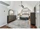 Bedroom with hardwood floors, a vaulted ceiling, and gray furniture offering a comfy space at 1500 Elmwood St, Clearwater, FL 33755