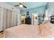 Bright bedroom with wood floors, ceiling fan, and lots of natural light from the window at 1500 Elmwood St, Clearwater, FL 33755