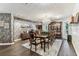 Stylish dining area with dark wood floors, a chandelier, and buffet with bar at 1500 Elmwood St, Clearwater, FL 33755